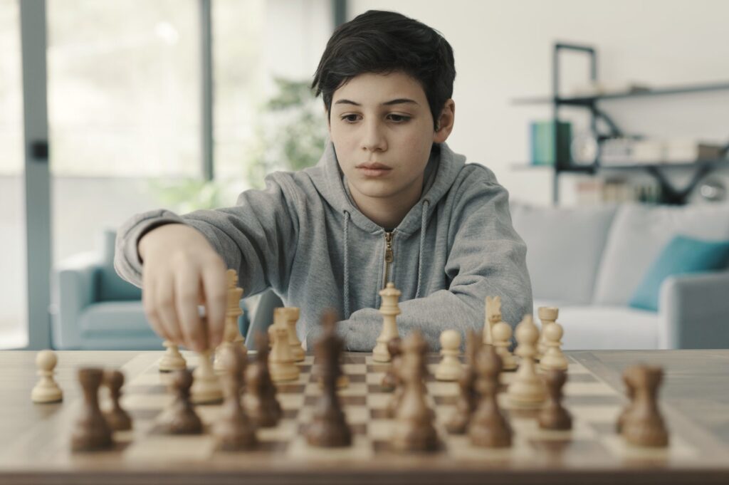 boy-playing-chess-at-home-e1650355543916.jpg